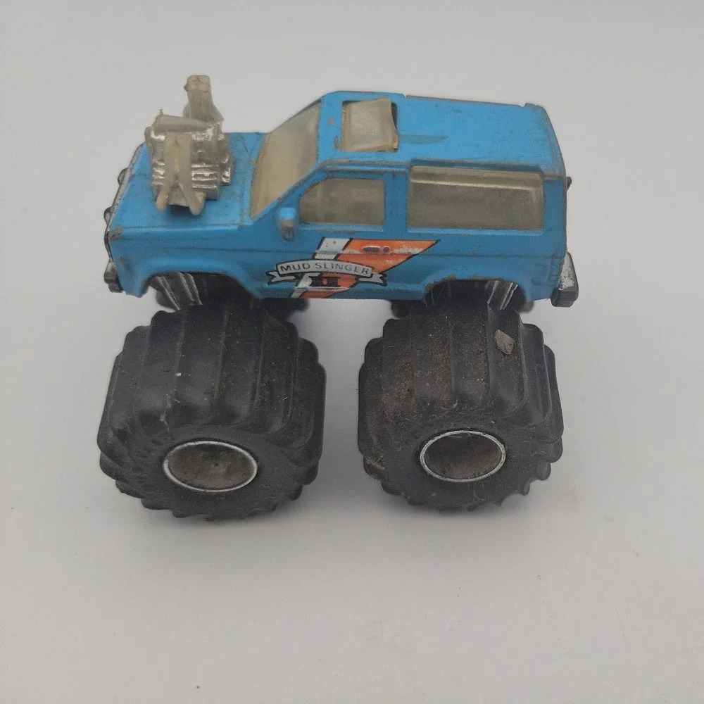 Vintage Matchbox Mud Slinger 1987 Blue Monster Truck Goodyear Tires Ford Bronco